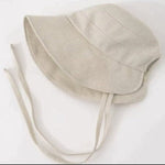 This stylish linen Ponytail-Friendly garden hat combines sun protection with everyday practicality. Designed with a clever back opening. Perfect for wearing with a ponytail or bun, no more adjusting your hair to fit your hat. The breathable linen fabric keeps you cool Available in beige and camel