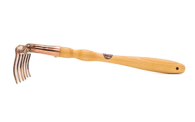 copper handrake with wooden handle